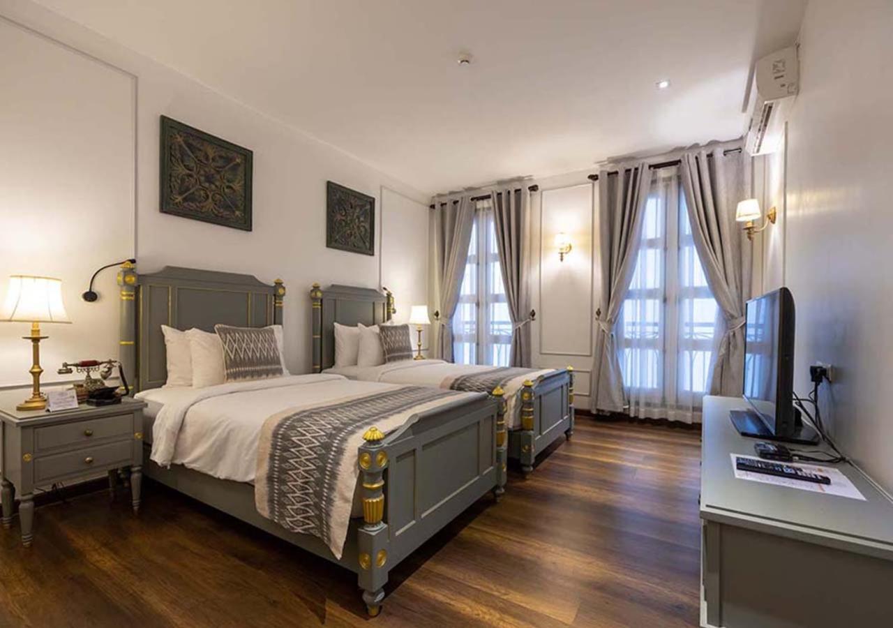 Le Thatluang D'Or Boutique Hotel Вьентьян Экстерьер фото
