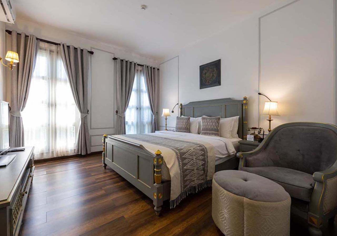 Le Thatluang D'Or Boutique Hotel Вьентьян Экстерьер фото