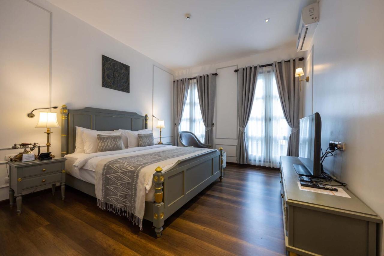Le Thatluang D'Or Boutique Hotel Вьентьян Экстерьер фото