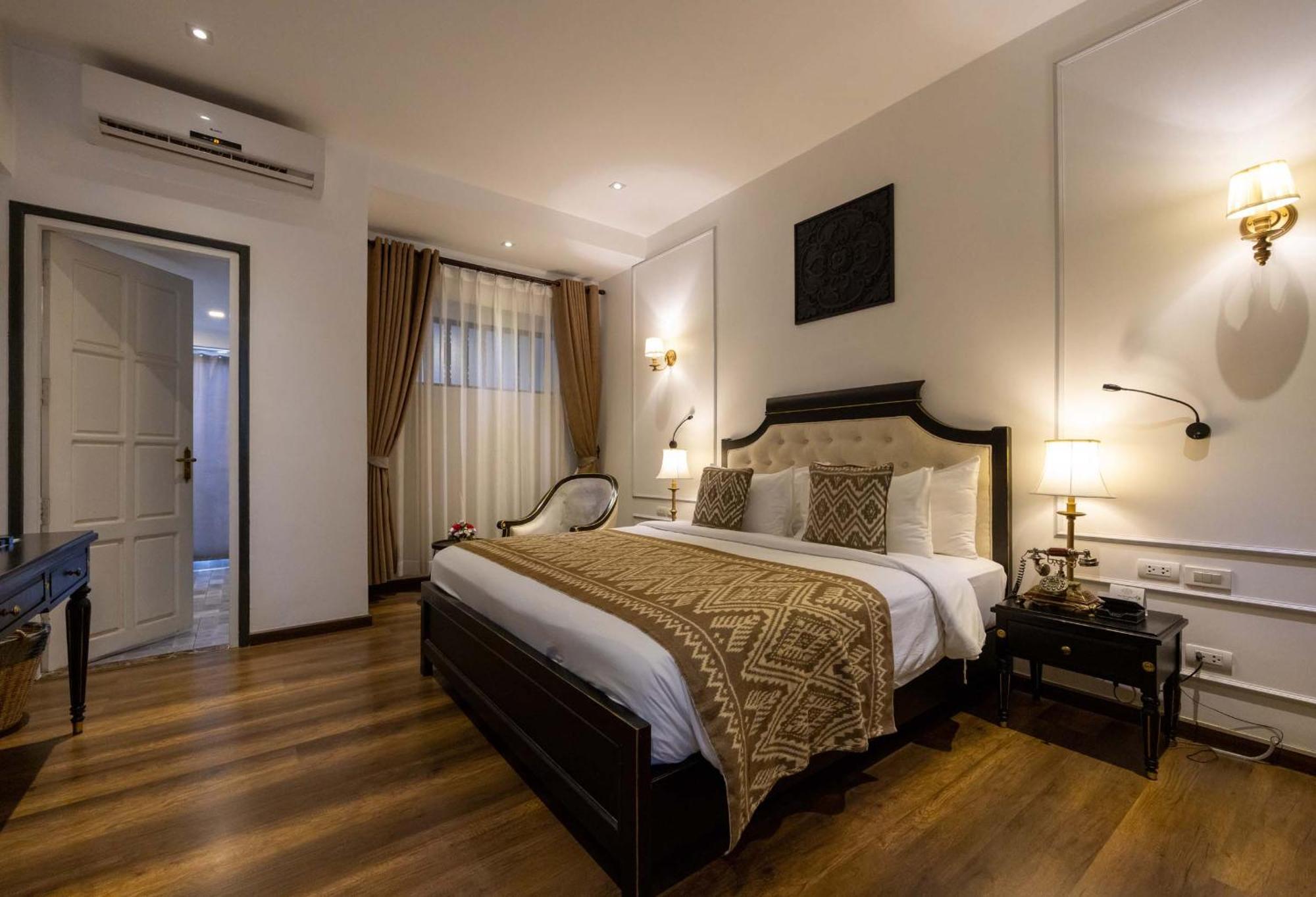 Le Thatluang D'Or Boutique Hotel Вьентьян Экстерьер фото